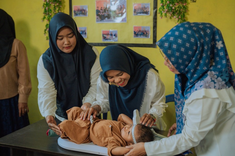 Semangat Hari Kebangkitan Nasional Pertamina Patra Niaga Kilang Dumai Bersama Kelompok Wanita Mundam Berseri Perkuat Pencegahan Stunting