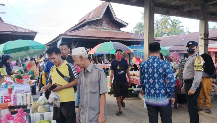 Pastikan Masyarakat Pasar Surau Gading Aman, Personil Polsek Rambah Samo Giat OTRLK 2022